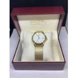 A ROTARY CALENDAR WRIST WATCH WITH PRESENTATION BOX SEEN WORKING BUT NO WARRANTY