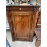 A GEORGE III OAK CORNER CUPBOARD