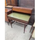 A RETRO TEAK WRITING DESK, 36" WIDE, WITH SINGLE DRAWER, THE FAUX LEATHER SURFACE HAVING DROP-DOWN