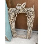 A DECORATIVE DRIFT WOOD PICTURE/MIRROR FRAME