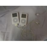 TWO APPLE IPODS 2ND GENERATION WITH LEAD IN WORKING ORDER BUT NO WARRANTY