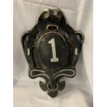 A LARGE VINTAGE CAST IRON DOOR NUMBER ONE