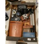 A BOX CONTAINING CAMERAS, A CANON, A YASHICA GSN AND AN AGFA ISOLA AND A PAIR OF NIPOLE BINOCULARS