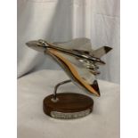 A CHROME VULCAN BOMBER ON WOODEN BASE WITH INSCRIPTION