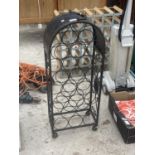 A DECORATIVE METAL WINE RACK