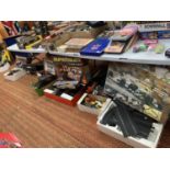 AN EXTENSIVE COLLECTION OF SCALEXTRIC. TO INCLUDE A VARIETY OF TRACKS AND CARS