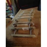 SIX DRAWER HANDLES WITH WHITE METAL DECORATION