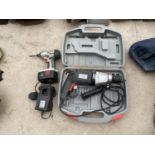 AN ELECTRIC DRILL AND A FURTHER BATTERY DRILL