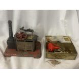 A MAMOD STATIONARY STEAM ENGINE (REQUIRES REBUILDING) AND A VINTAGE TIN CONTAINING VARIOUS PARTS AND