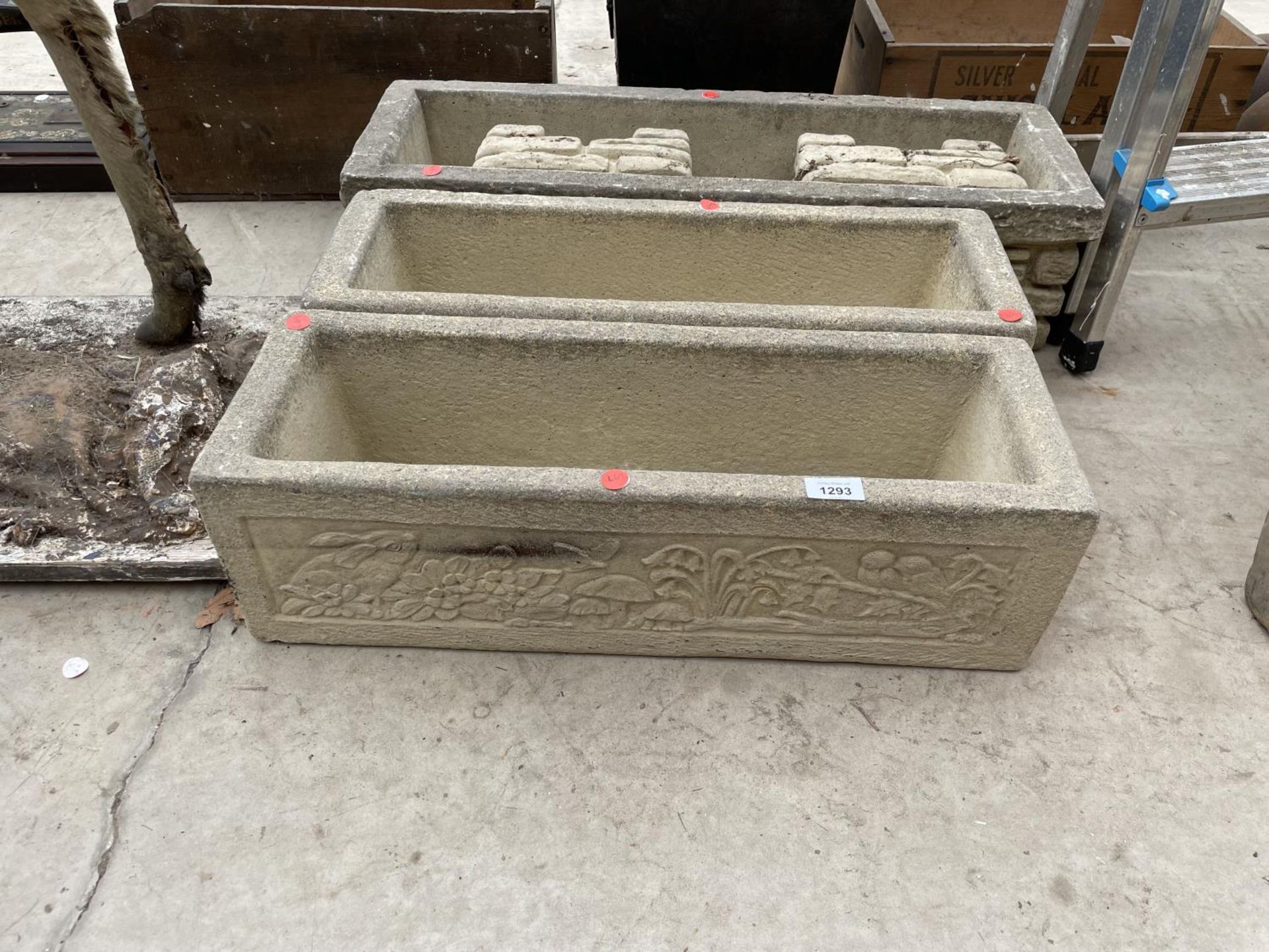 A GROUP OF THREE STONE EFFECT PLANTERS