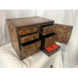 A MARQUETRY CABINET WITH FOUR DRAWERS, TWO INNER DRAWERS, DECORATIVE HINGES AND SIDE HANDLES (NO