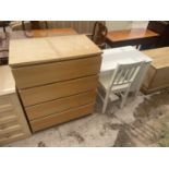 A MODERN WHITE CHILDS DESK AND CHAIR AND CHEST OF FOUR DRAWERS
