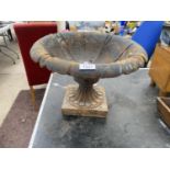 A VINTAGE CAST IRON URN PLANTER