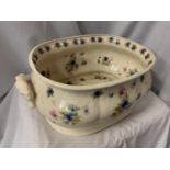 AN ORNATE VINTAGE CHINA BOWL WITH HANDLES
