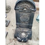 A DECORATIVE CAST IRON WATER FEATURE