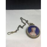 A DEOCRATIVE LADIES POCKET WATCH WITH CHAIN