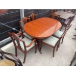 A YEW WOOD EXTENDING TWIN-PEDESTAL DINING TABLE AND SIX CHAIRS, TWO BEING CARVERS