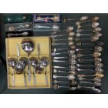 A LARGE COLLECTION OF SOUVENIR SPOONS AND A BOXED SET OF FRUIT SPOONS WITH SERVING SPOON