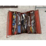 A METAL TOOL BOX WITH A LARGE ASSORTMENT OF HAND TOOLS TO INCLUDE SPANNERS, SOCKETS AND PUNCHES ETC