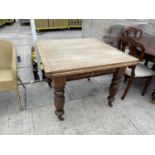 A VICTORIAN DRAW-LEAF SCRUB-TOP TABLE ON TURNED AND FLUTED LEGS, 40X38"