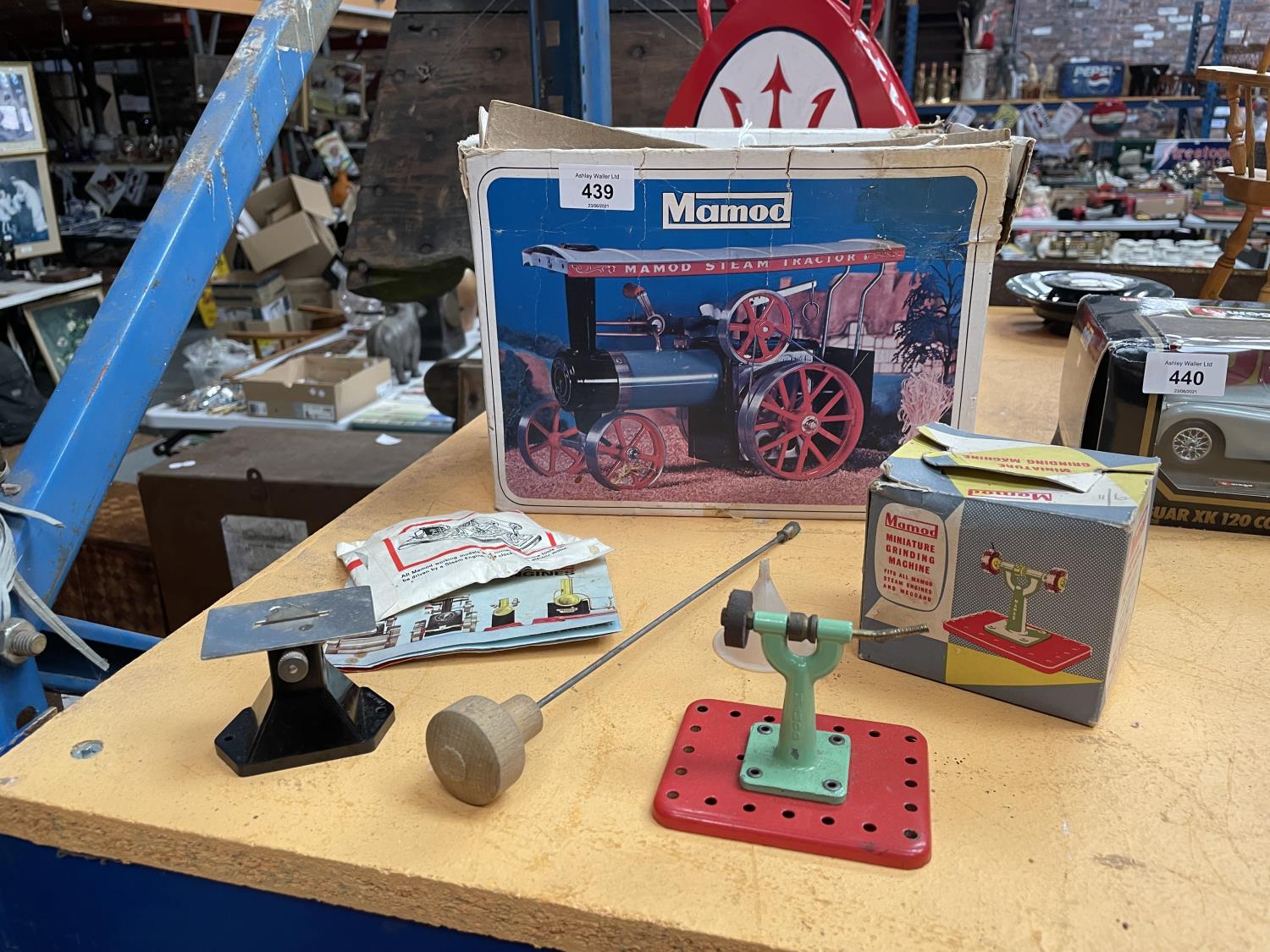 VARIOUS MAMOD ITEMS * A CIRCULAR SAW, GRIND STONE, FUNNEL, EMPTY STEAM TRACTOR BOX ETC
