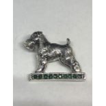 A MARKED SILVER BROOCH WITH GREEN STONES IN THE GUISE OF A SCHNAUZER DOG