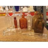 A MIXED COLLECTION OF VINTAGE GLASS BOTTLES