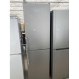 A SILVER HOTPOINT UPRIGHT FRIDGE FREEZER BELIEVED IN WORKING ORDER BUT NO WARRANTY