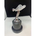 A CHROME FLYING LADY STYLE CAR MASCOT ON A MARBLE BASE