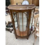 A MID 20TH CENTURY OAK CHINA CABINET