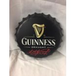 A RETRO "GUINESS" BOTTLE CAP SIGN 35CM DIAMETER