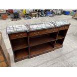 A MAHOGANY BREAKFRONT BOOKCASE