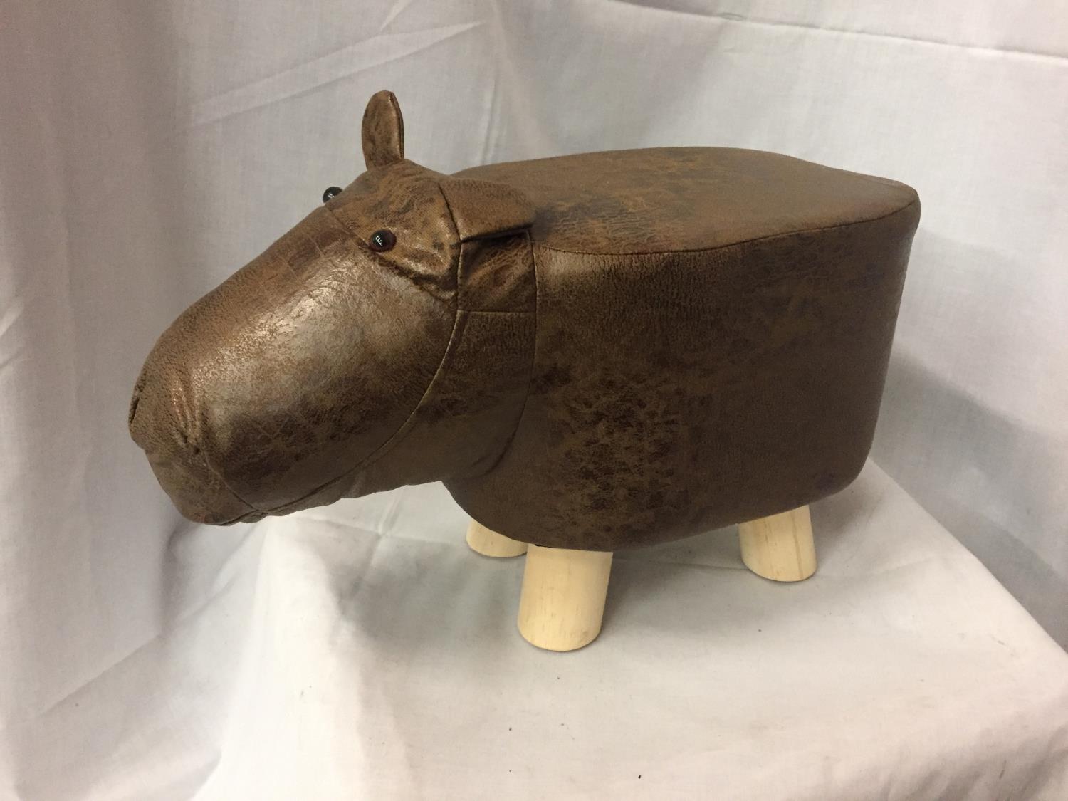 A FAUX LEATHER 'HIPPO' FOOTSTOOL/CHILDRENS STOOL