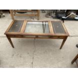 A REPRODUX MAHOGANY COFFEE/DISPLAY TABLE WITH INSET LEATHER TOP, 48X22"