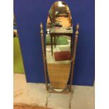 A BRASS CHAVEL FLOOR STANDING MIRROR