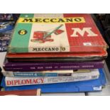 A COLLECTION OF SIX VINTAGE GAMES , TO INCLUDE A MECCANO SET, MONOPOLY, CONNECT FOUR