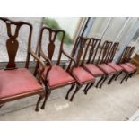 A SET OF EIGHT QUEEN ANNE STYLE DINING CHAIRS ON CABRIOLE LEGS, TWO BEING CARVER