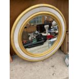 A LARGE DECORATIVE FRAMED BEVELED EDGE MIRROR