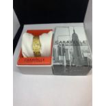 A CARAVELL NEW YORK LADIES YELLOW METAL WRIST WATCH WITH PRESENTAION BOX SEEN WORKING BUT NO