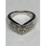 AN 18 CARAT WHITE GOLD RING IN A WISHBONE DESIGN WITH FIVE IN LINE DIAMONDS SIZE M/N