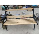 A REFURBISHED WOODEN SLATTED GARDEN BENCH WITH CAST BENCH ENDS