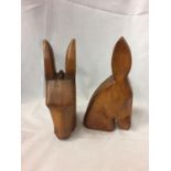 A PAIR OF TREN CARVED BOOKENDS