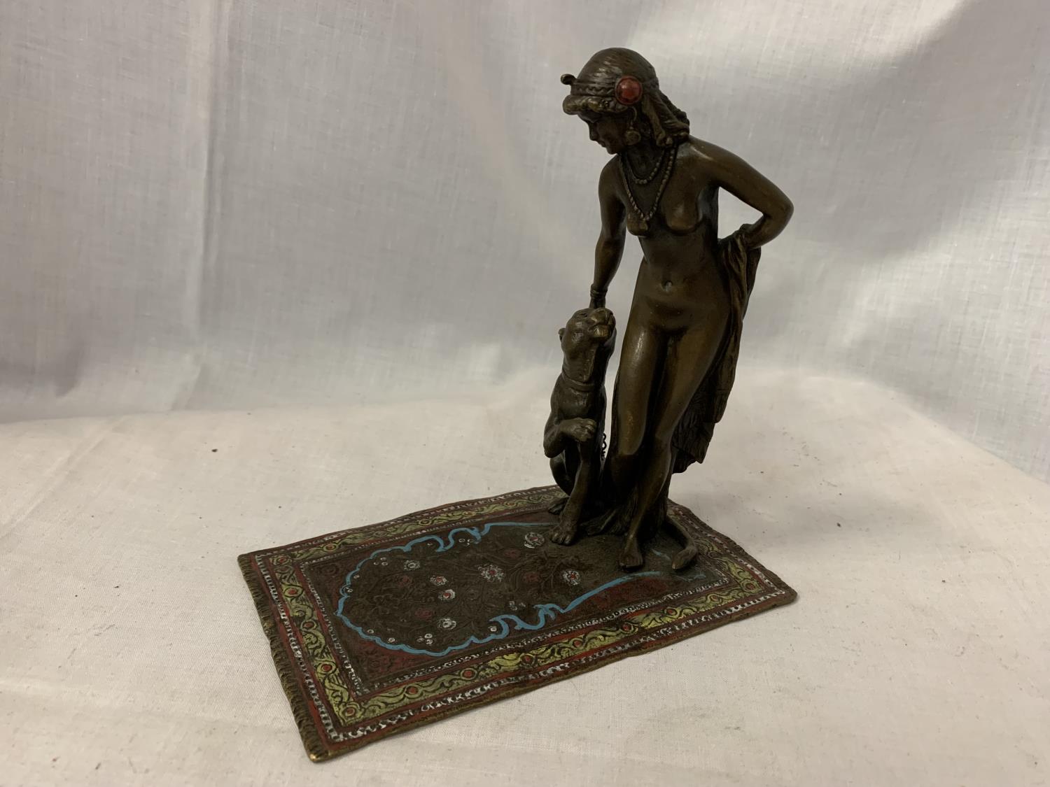 A BERGMAN STYLE COLD PAINTED NAN GREB BRONZE IN THE FORM OF A DANCER AND LIONESS H: APPROXIMATELY