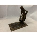 A BERGMAN STYLE COLD PAINTED NAN GREB BRONZE IN THE FORM OF A DANCER AND LIONESS H: APPROXIMATELY