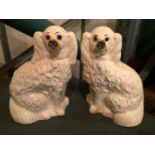 A PAIR OF STAFFORDSHIRE FLAT BACK DOGS