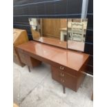 A TIMES FURNISHING RETRO SEVEN DRAWER DRESSING TABLE WITH TRIPLE MIRROR