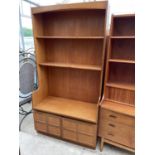 A RETRO TEAK NATHAN STYLE OPEN UNIT WITH CUPBOARDS TO THE BASE, 40" WIDE