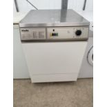 A MIELE PROFESSIONAL T5206 CONDENSOR DRYER BELIEVED IN WORKING ORDER BUT NO WARRANTY
