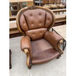 A VICTORIAN STYLE BUTTON-BACK WINGED EASY CHAIR ON FRONT CABRIOLE LEGS