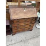A GEORGE III MAHOGANY BUREAU, 35.5" WIDE WITH FITTED INTERIOR